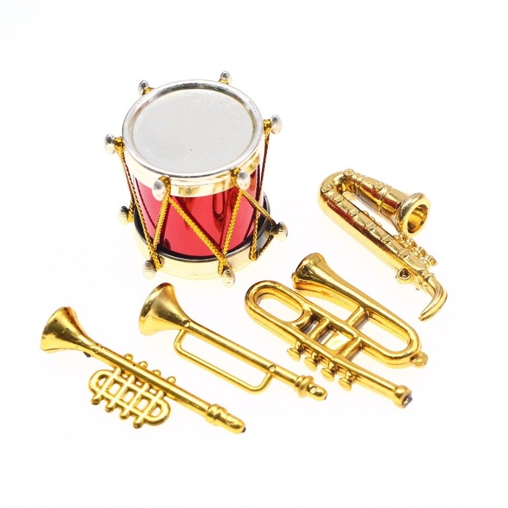 مجموعة آلات موسيقية مصغرة لتزي - مراجعة Musical Instrument Horn وسعره